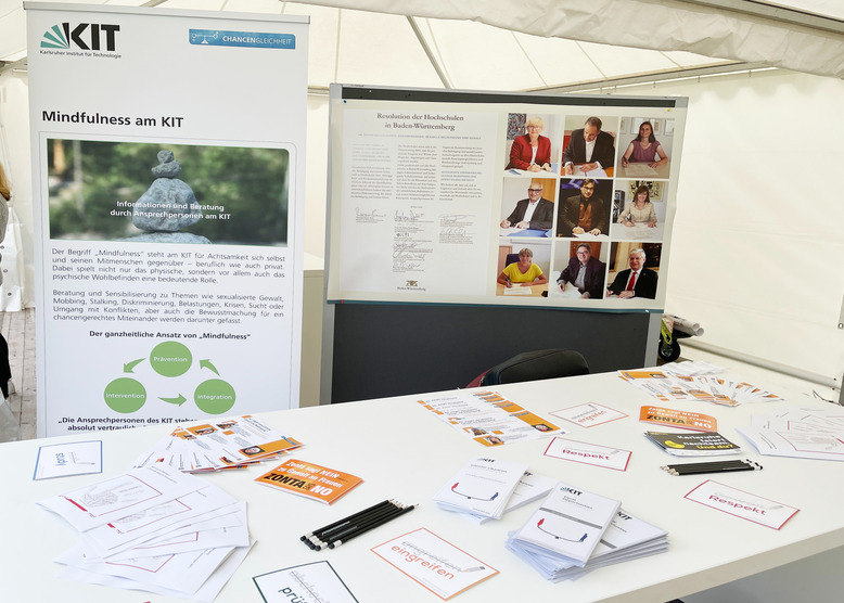 Table with flyers and rollups.